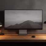 monitor 4K em cima de escrivaninha