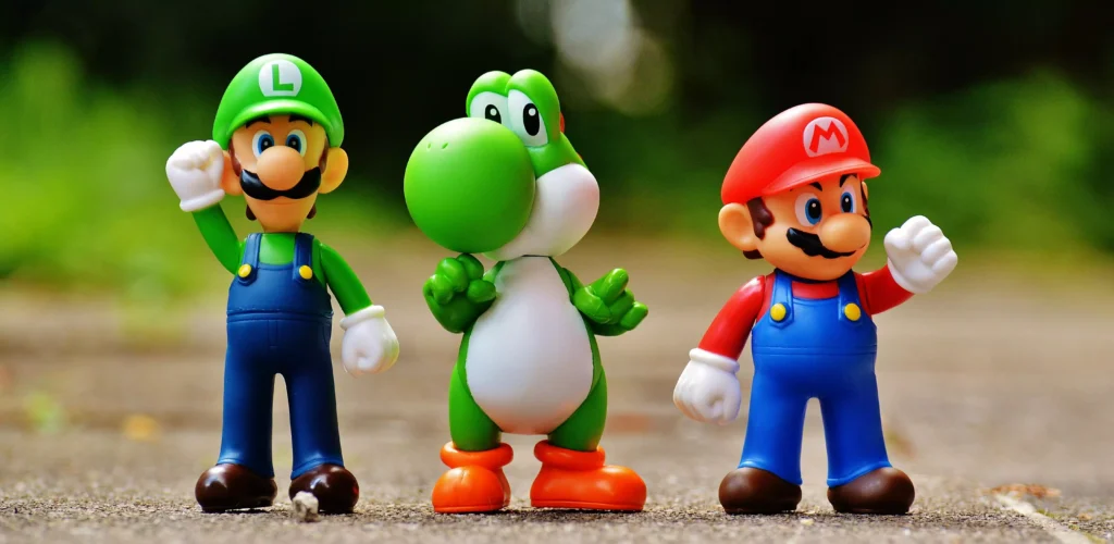 videogame-nintendo-capa bonecos dos personagens da franquia Mario Bross ilustrando videogame da Nintendo